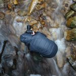 hiker checking smartwatch