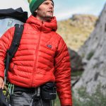 hiker checking watch altimeter