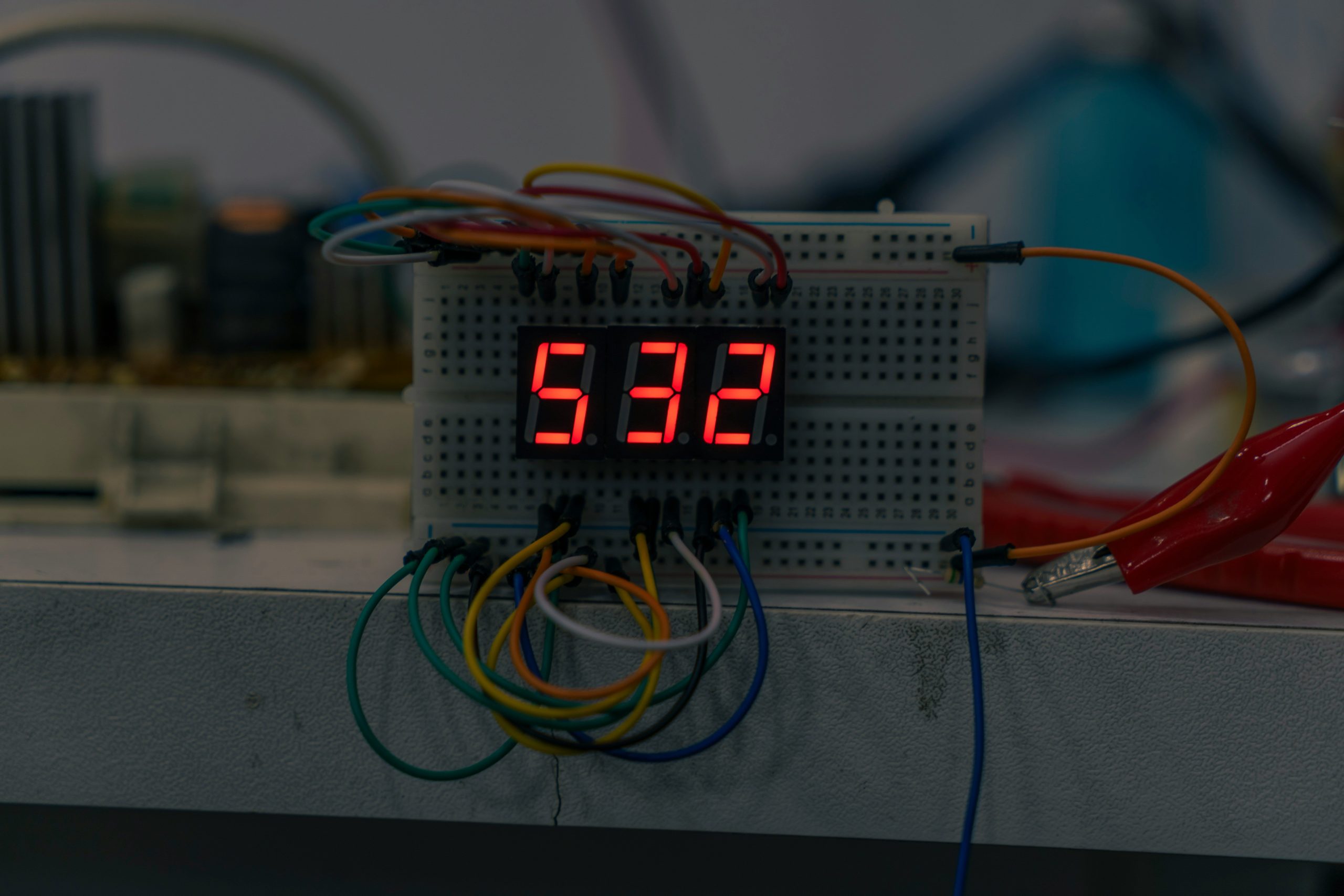 A vintage watch next to a modern smartwatch with an altimeter feature.