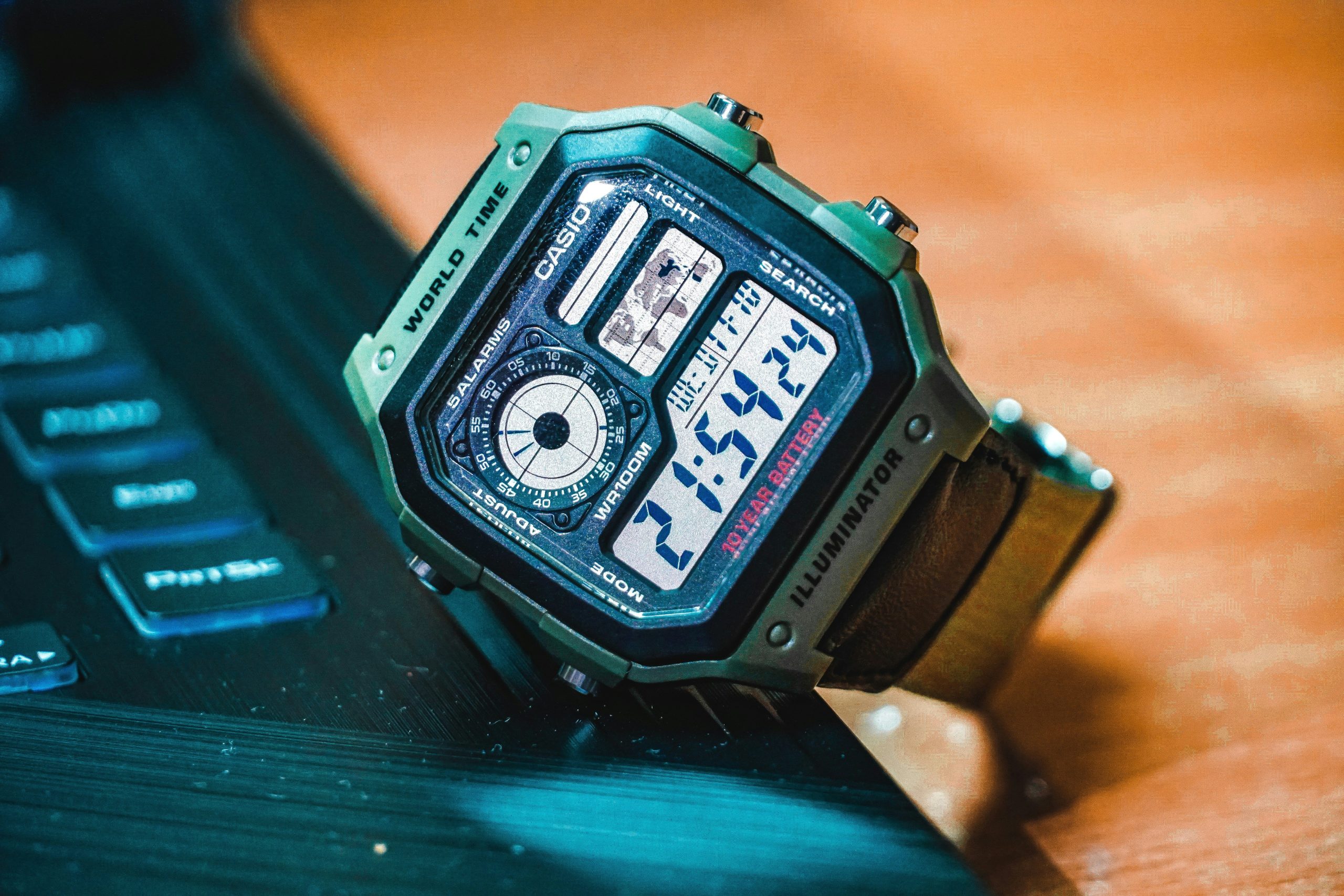 A durable trail watch being worn while hiking in harsh conditions.