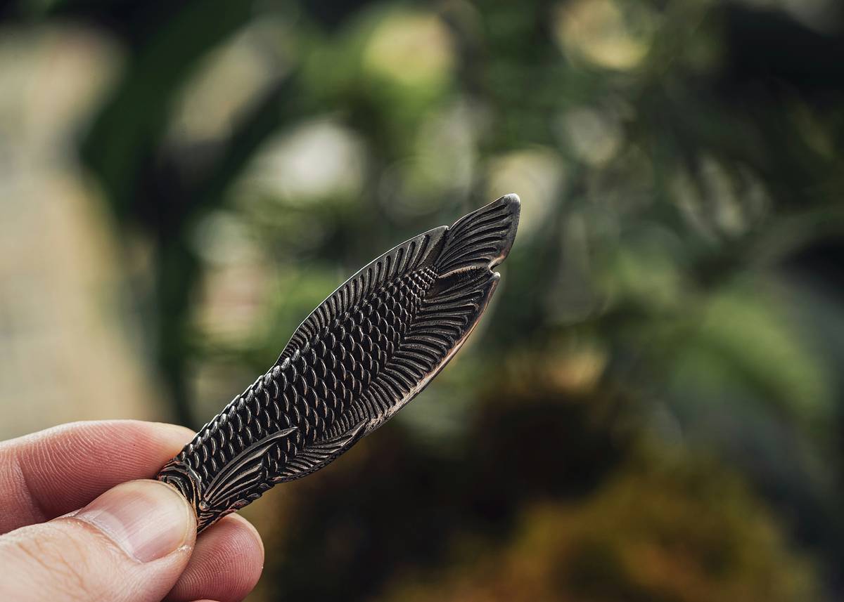 A close-up of a rugged watch with an altimeter display showing elevation data.